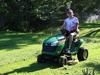 14 Adam on lawn tractor - August 15, 2021